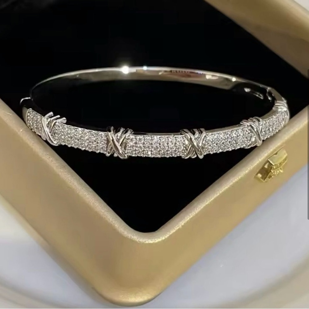 Chic Silver Bangle Bracelet with X and Crystal Accents - Picture 3 of 3